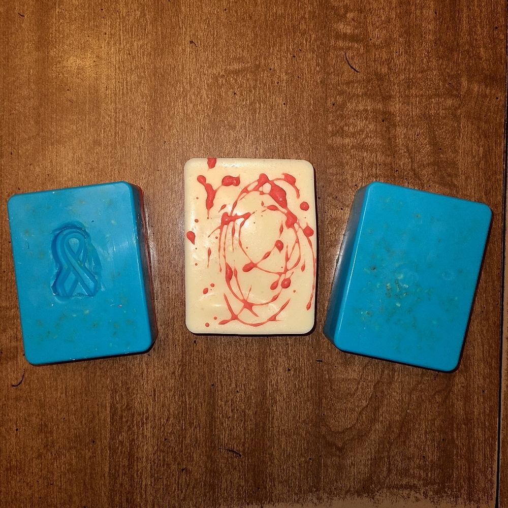 Three bars of handmade soap. Blue raspberry & banana berry scents